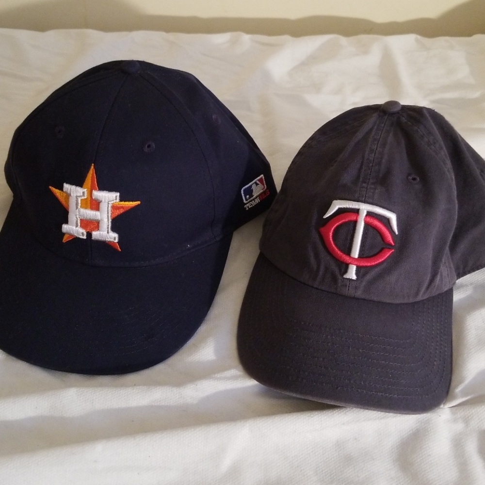 Two baseball hats